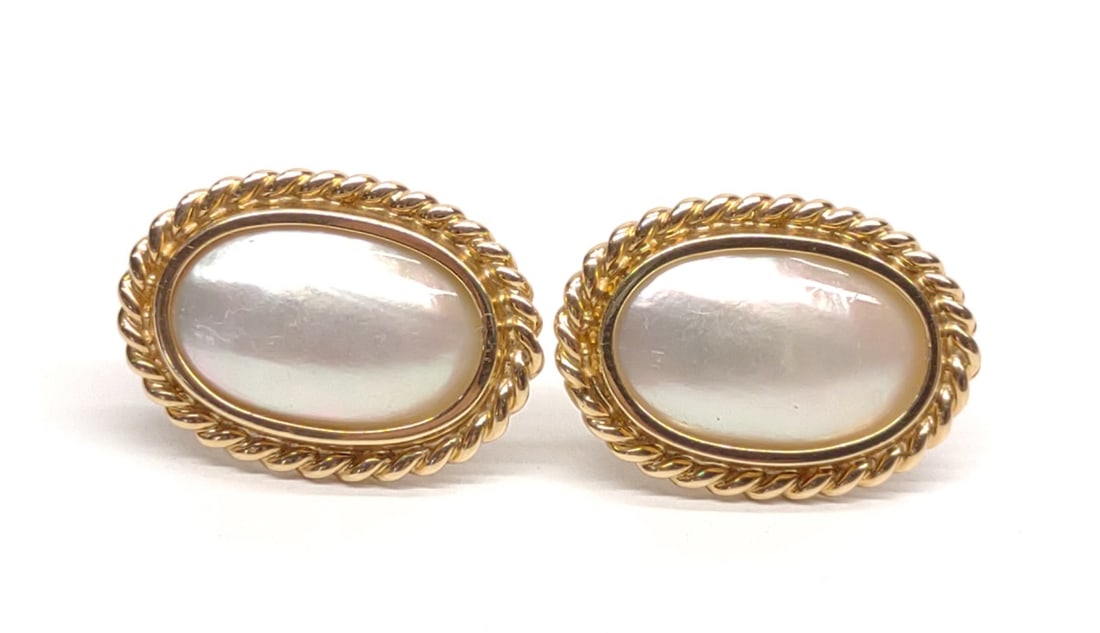 14K Yellow Gold Mabe Pearl Earrings: A pair of vintage 14 karat yellow gold mabe pearl stud earrings. Pearls measure 11mm x 16mm. Marked "14K" and hand signed "PC". Has been tested for purity. Total Weight: 8.40 grams.