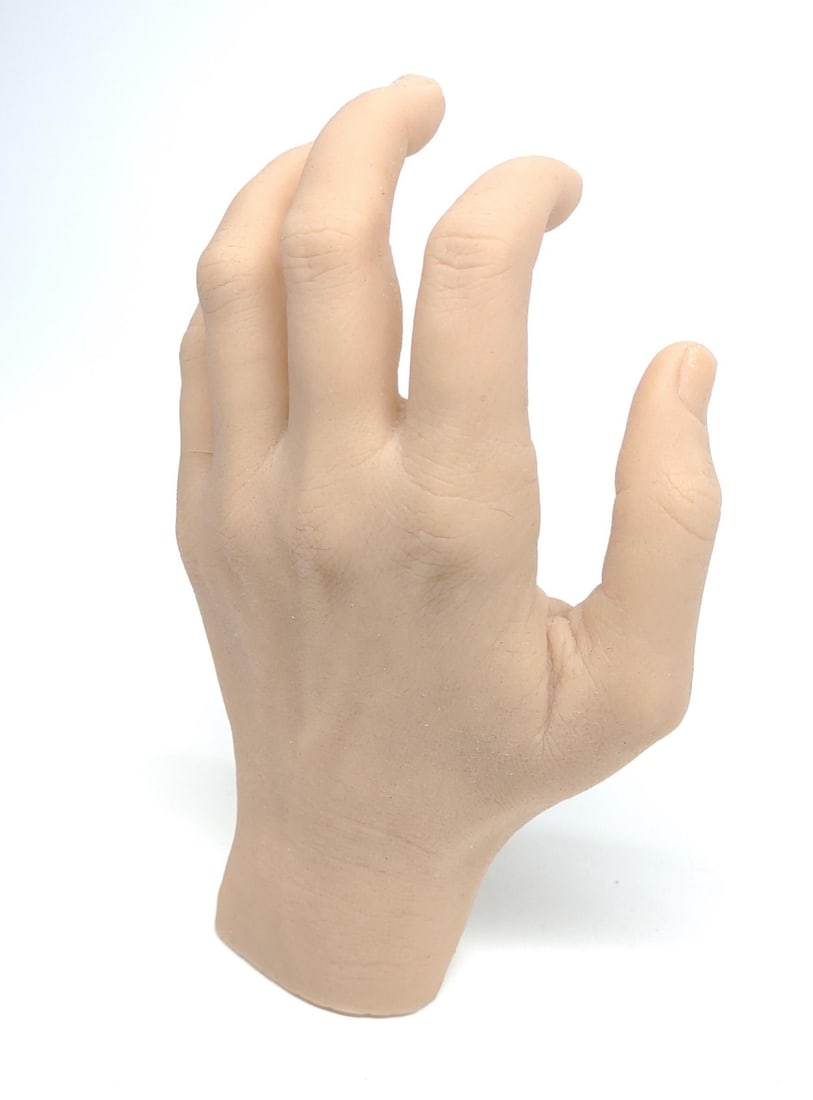 Life Sized Silicone Hand Prop: Realistic life sized silicone hand prop. Pose-able fingers. Split where pinky finger meets hand.