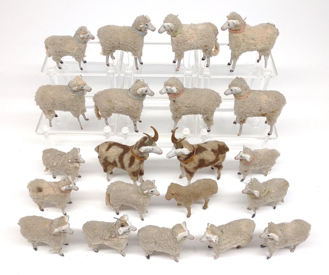 21 Antique German Putz Wool Stick Leg Sheep: 21 Antique German Erzgebirge Putz stick leg wool sheep figurines / miniatures. Figures include 2 horned sheep, 7 larger sheep, 11 smaller sheep, and 1 dog. Largest figure measures approximately 3" tal
