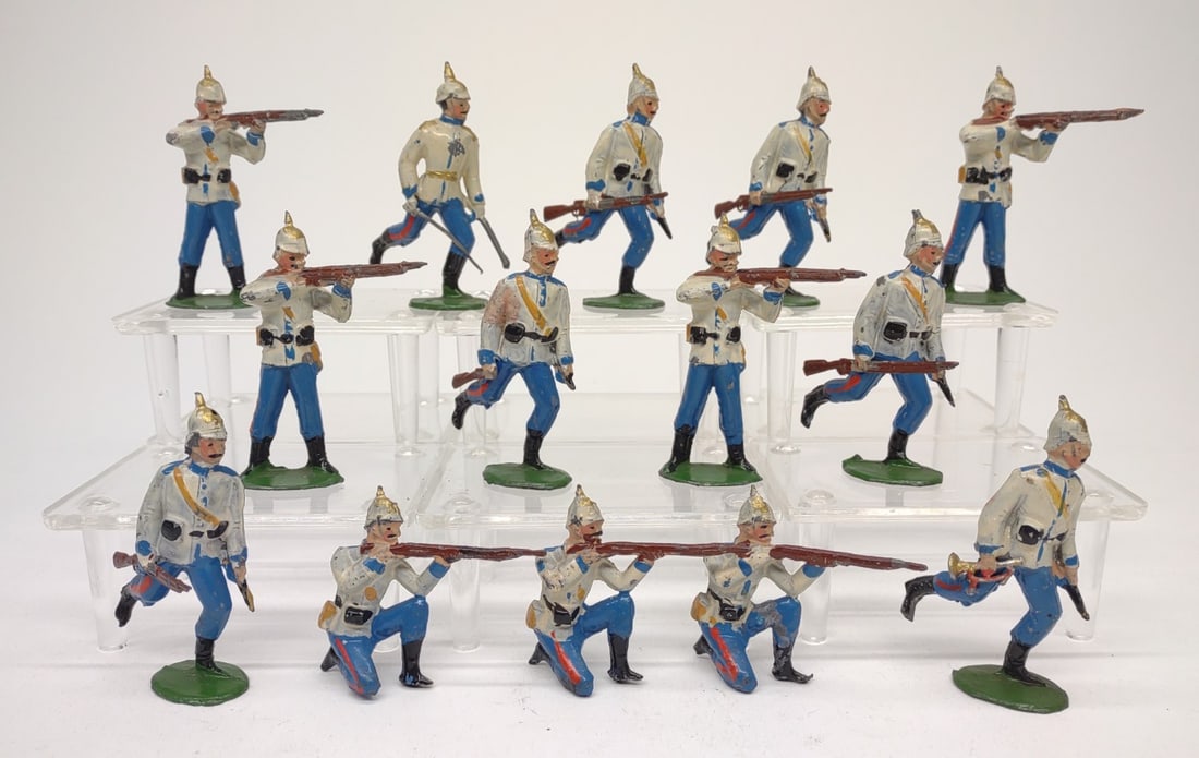 14 Vintage Military Lead Toy Soldiers: Group of 14 vintage / antique military lead toy soldiers. Underside is unmarked. Tallest measures 2.5" tall.NOTE: In-house international shipping NOT available for this item. UPS third party or privat