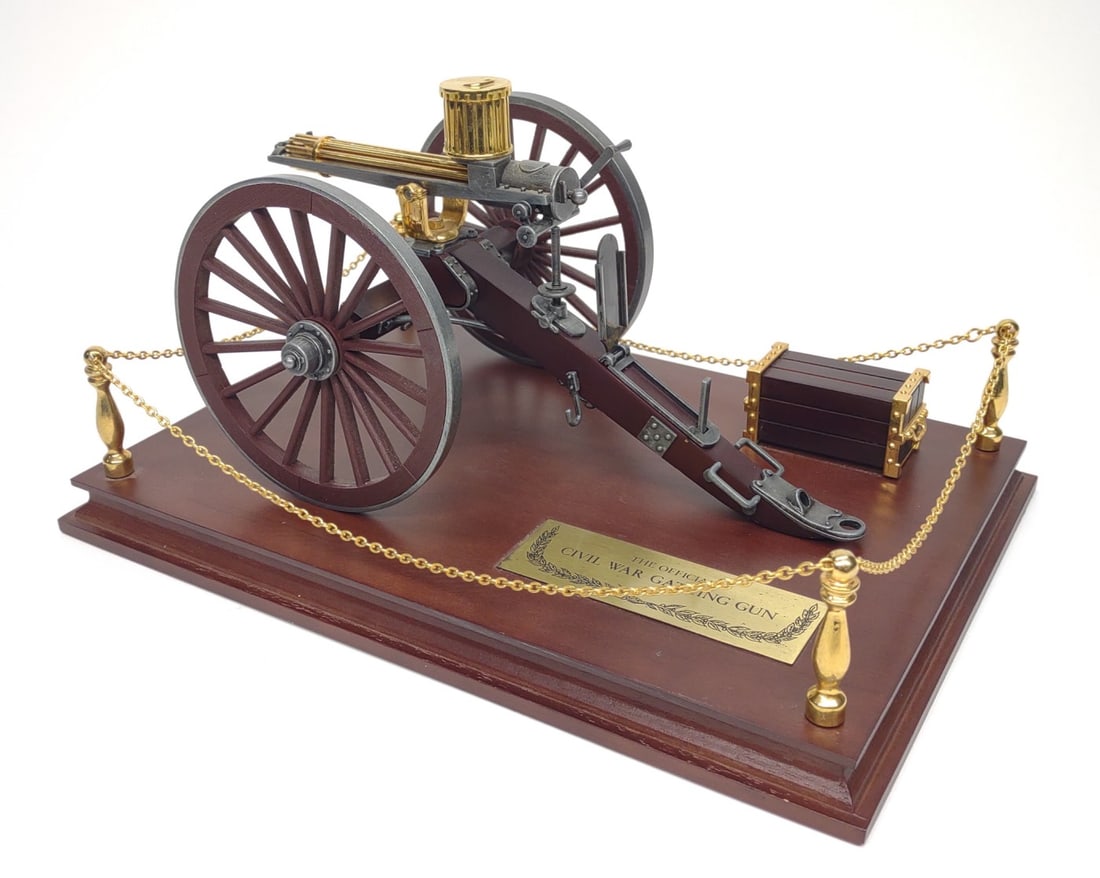 Franklin Mint Civil War Gatling Gun Model: The Official Civil War Gatling Gun Model 1857 made by The Franklin Mint. Features rotating barrels, rotating turret, and rolling wheels. Gatling gun model measures approximately 4.75" tall. NOTE: In-h