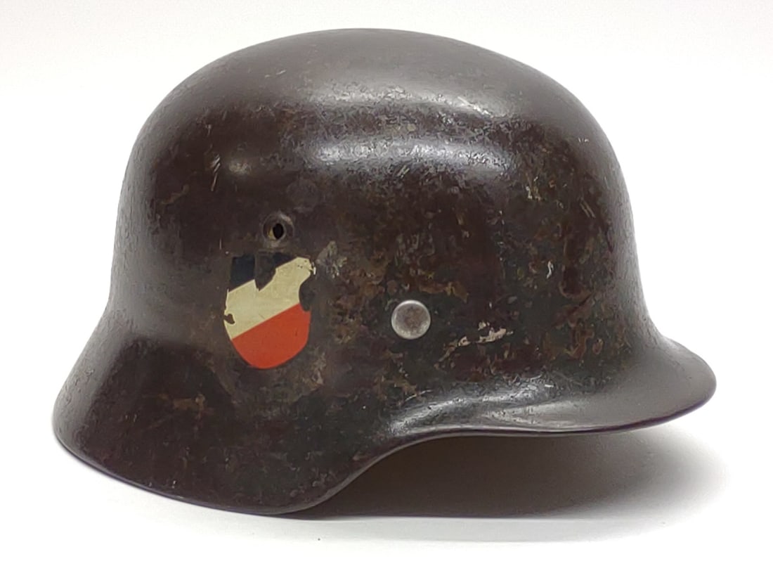 WWII German M35 Heer Double Decal Helmet: Vintage World War Two (WW2) German military M35 Heer double decal helmet. Features German Heer decals on both sides of helmet (Eagle with Swastika, and black, white, and red shield). Inside of helmet 