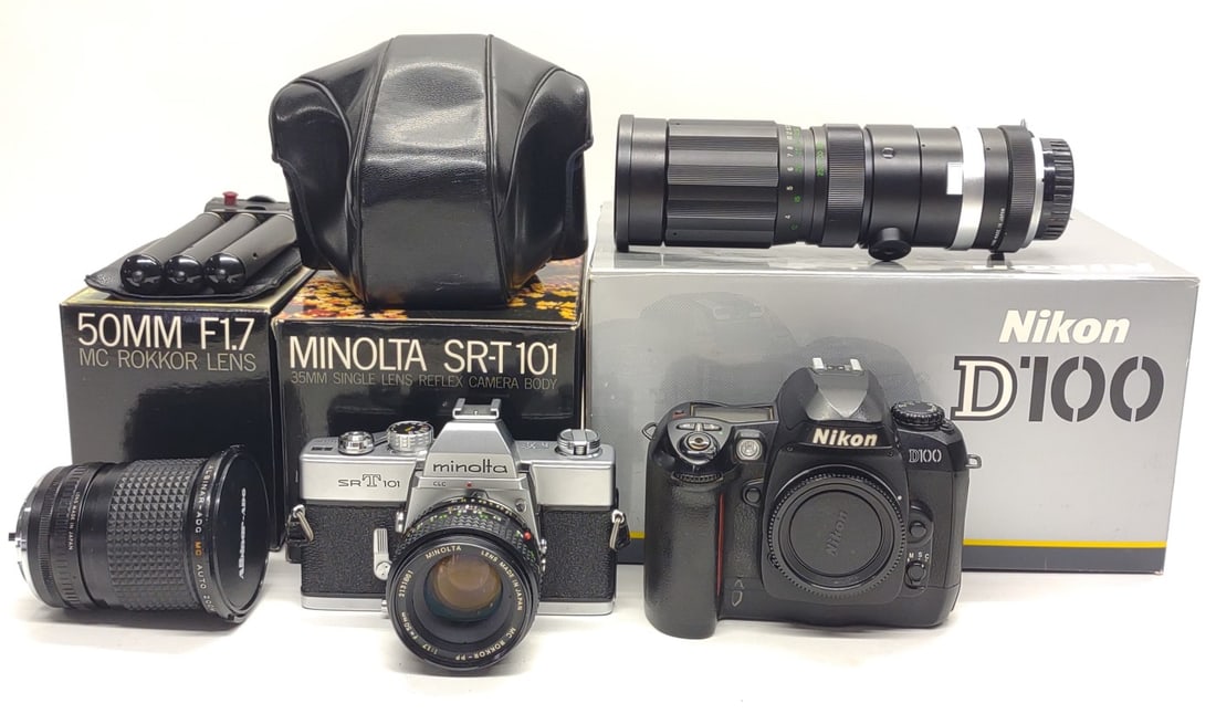 A Mamiya Press Sekor 50mm F6.3 Lens With External Viewfinder. A Mamiya Press Sekor 50mm F6.3 Lens With External Viewfinder.