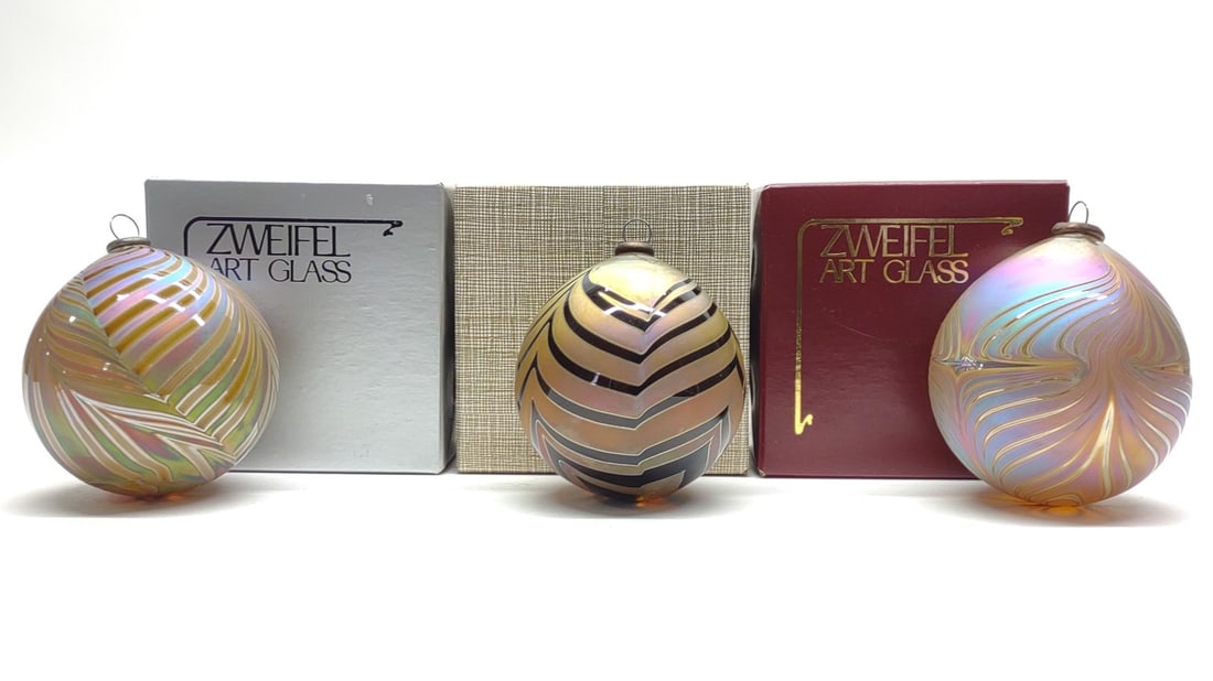 (3) Zweifel Art Glass Christmas Ornaments (Signed): (3) Vintage Craig Zweifel art glass 3" Christmas tree ball shape ornaments. (1) signed "Zweifel 1983", (1) signed "Zweifel 1984" and (1) signed "Zweifel 1986". All in good condition, no chips or crack