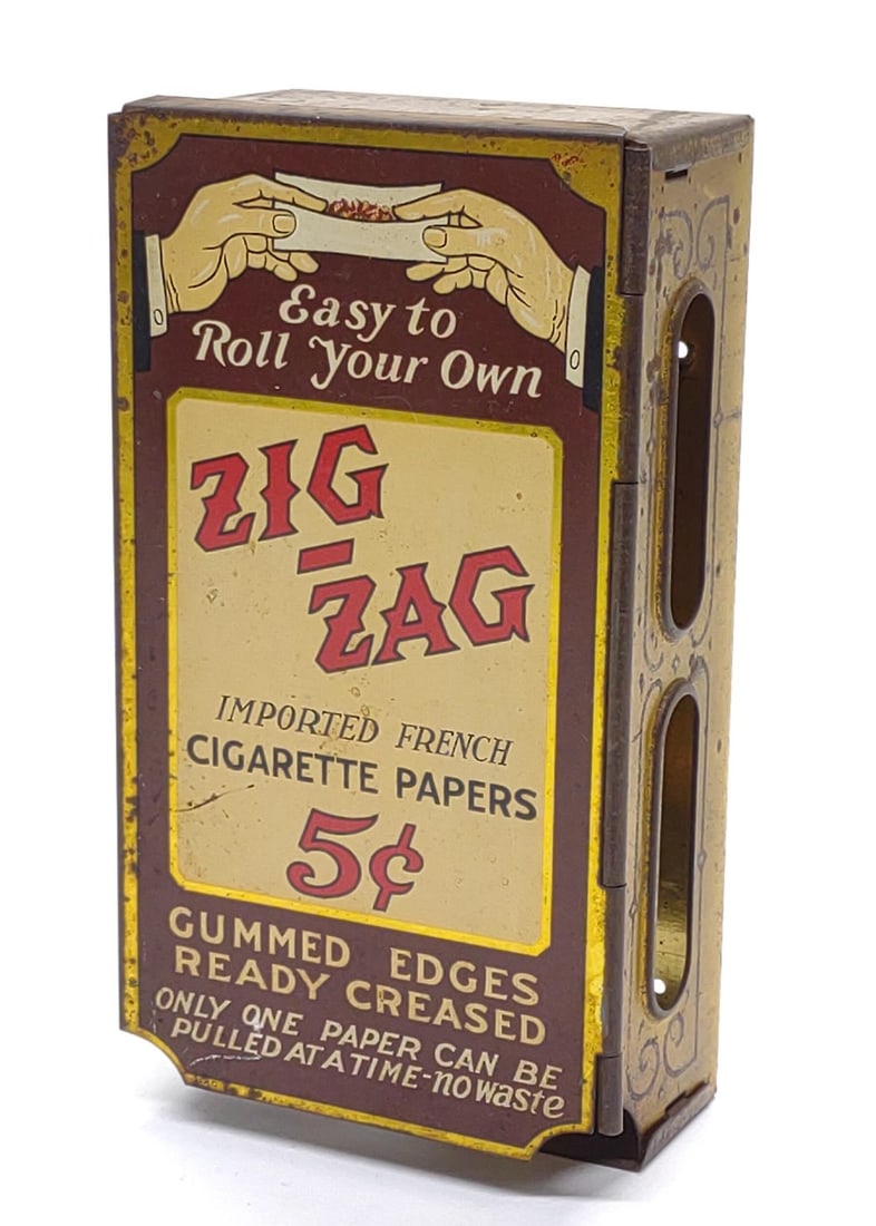 Vintage Zig Zag Cigarette Rolling Paper dispenser: Vintage Zig Zag cigarette / tobacco rolling paper store advertising dispenser single sided tin sign. Reads "Easy To Roll Your Own, Zig-Zag, Imported French Cigarette Papers 5Cents, Gummed Edges, Ready