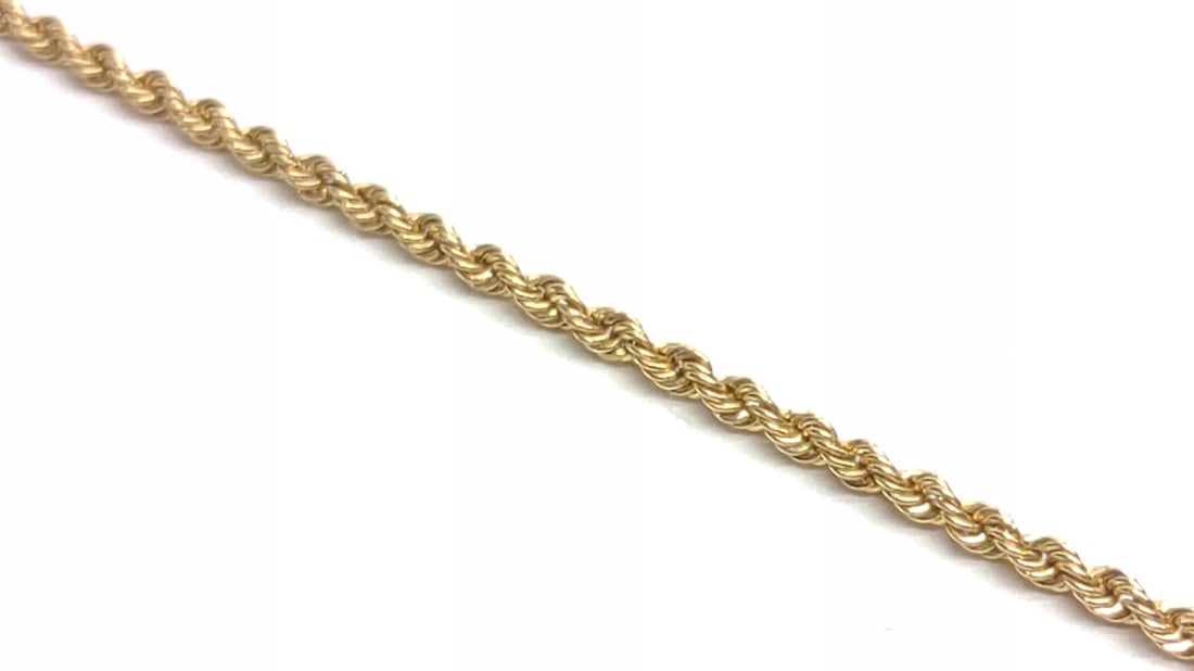 14K Yellow Gold Twist Rope Chain Necklace 24": 14 karat yellow gold twist rope chain necklace. 24" long. 1.8mm wide. Barrel clasp with single safety latch. Clasp is marked "14K". Has been tested for gold purity. Total weight: 6.7 grams. SHIPPING O