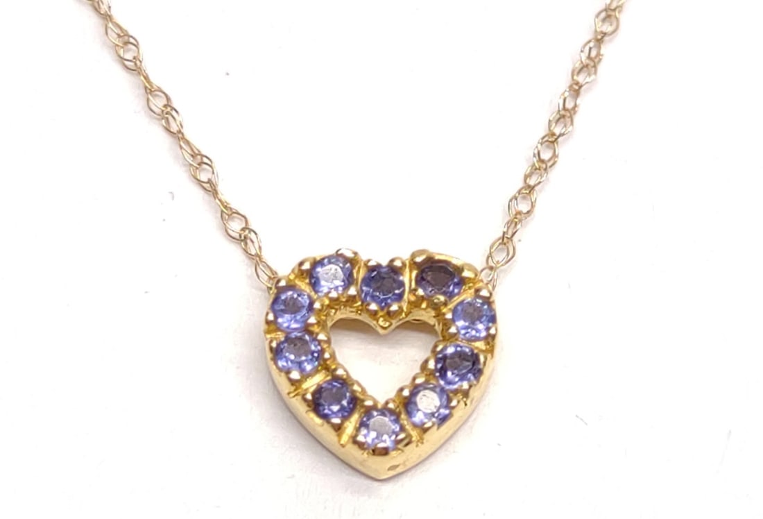 14K Gold Sapphire Heart Pendant & 14K Chain: 14 karat yellow gold heart shaped sapphire pendant with 14k yellow gold rope necklace chain (18" long). Both chain and pendant are marked "14K" and have been tested. Total weight: 0.9 grams. SHIPPING