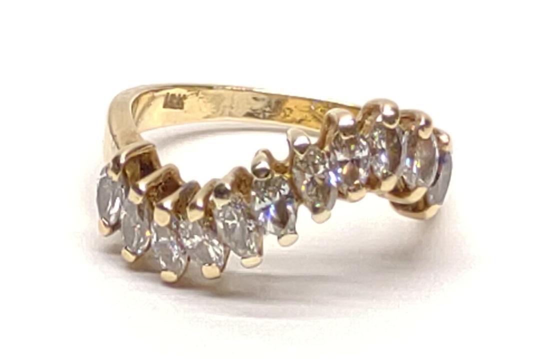 18K Gold Marquise Diamond 1.32 ctw Ring (sz 6.25): 18 karat yellow gold with 11 marquise cut diamonds (1.32 cttw). Inner band is marked "18K" with etched "90318". Has been tested for gold purity and stones. Ring size 6.25. Total Weight: 4.40 grams. SH