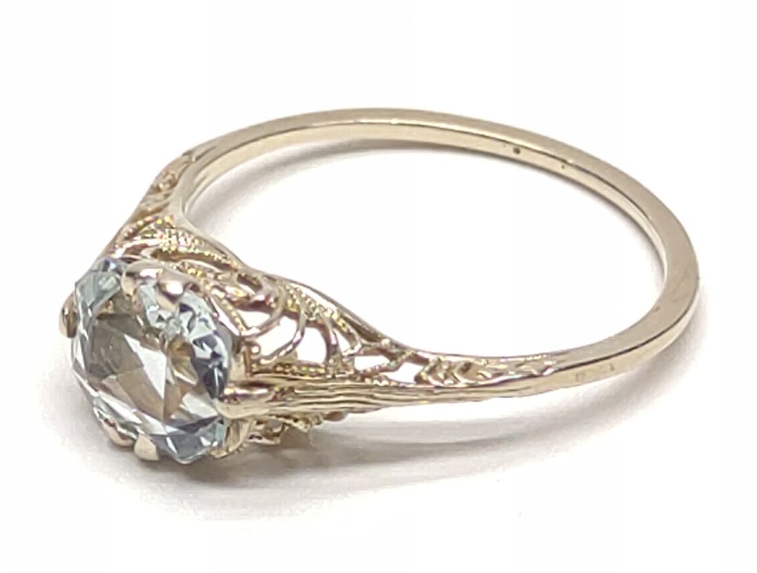 14K White Gold Aquamarine Art Deco Ring (sz 6): 14 karat white gold art deco ring with single radiant cut aquamarine (6mm x 7mm) accented with a filigree setting. Inner band is marked "14K". Has been tested for gold purity and stone (RI: 1.57).