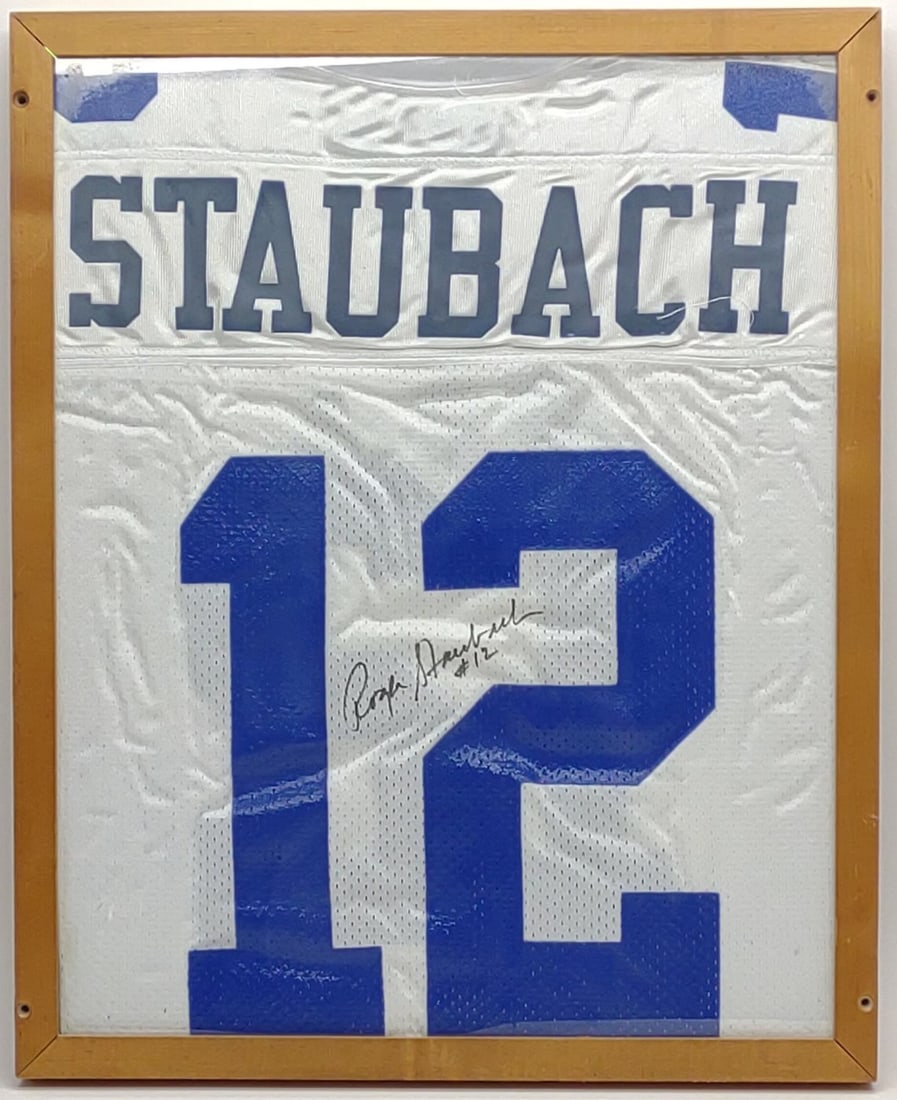 Roger Staubach Autographed NFL Cowboys Jersey COA: Framed 1995 Roger Staubach signed Dallas Cowboys NFL football team jersey. Includes Integrated Sports International certificate of authenticity (COA) and Run For The Sun Sweepstakes paper receipt. Fra