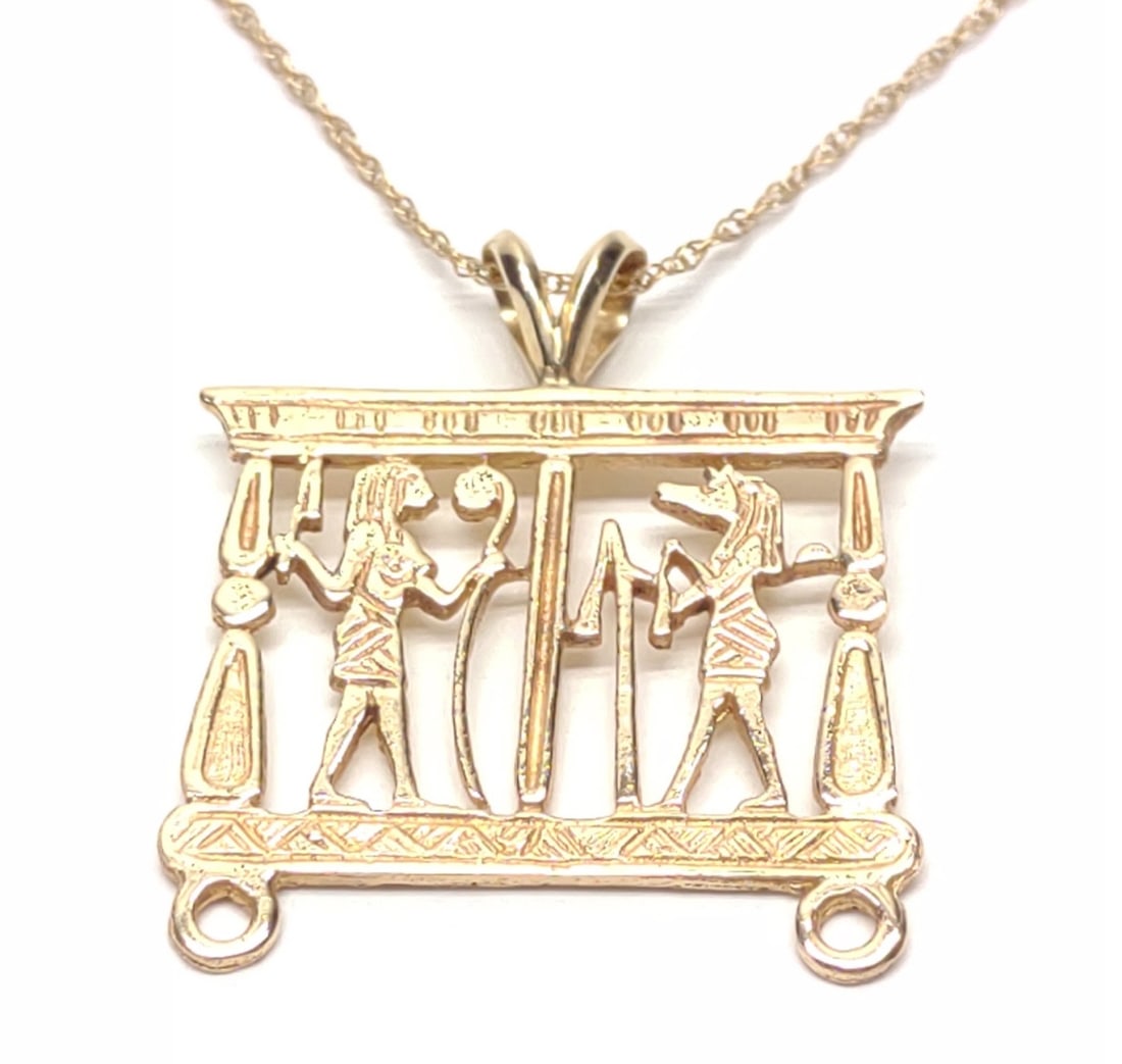 14K Gold Egyptian Necklace Pendant & Chain: 14 karat yellow gold Egyptian necklace pendant with 14k twist rope necklace chain. Chain measures 18" long. Pendant and chain are both marked "14K". Has been tested for gold purity. Total weight: 4.06