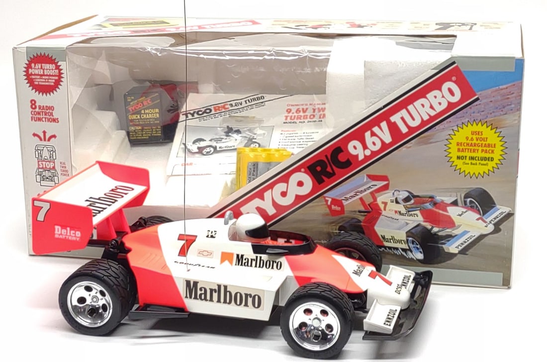 Tyco RC 9.6V Turbo Marlboro Indy Toy & Box (Works): Vintage 1990 Tyco R/C 9.6V Twin Turbo Marlboro Indy toy r/c race car, complete in box. Includes Marlboro Indy car, controller, instruction manual, (2) 9.6V batteries, 9.6V battery charger, and origina
