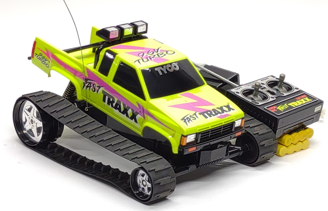 Tyco R/C 9.6V Turbo Fast Traxx Toy Truck (Works): Vintage Tyco R/C Fast Traxx 9.6 Volt Turbo truck toy w/ extras. Includes Fast Traxx r/c truck, 27 MHz controller, (2) 9.6V batteries, and 9.6V battery charger. R/C truck, controller, batteries, and ba