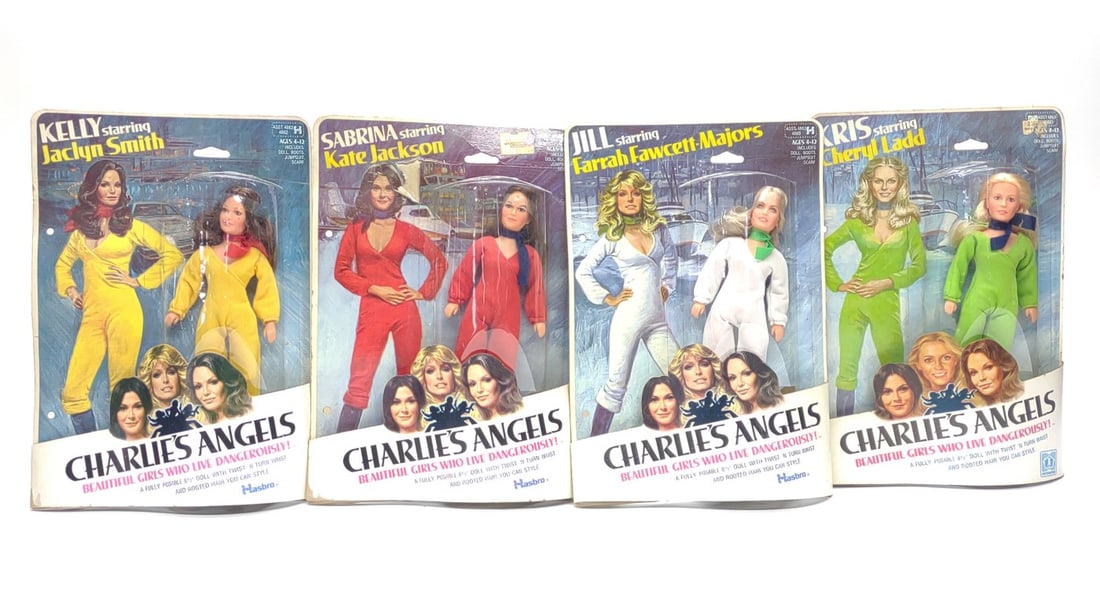 (4) 1977 Hasbro Charlies Angels Doll Toys Sealed: Four vintage 1977 Hasbro Charlie's Angels 8 1/2" action figure doll toys, sealed in original blister packs. Includes Kris 4850, Sabrina 4861, Jill 4860, and Kelly 4862. Each blister pack measures appr