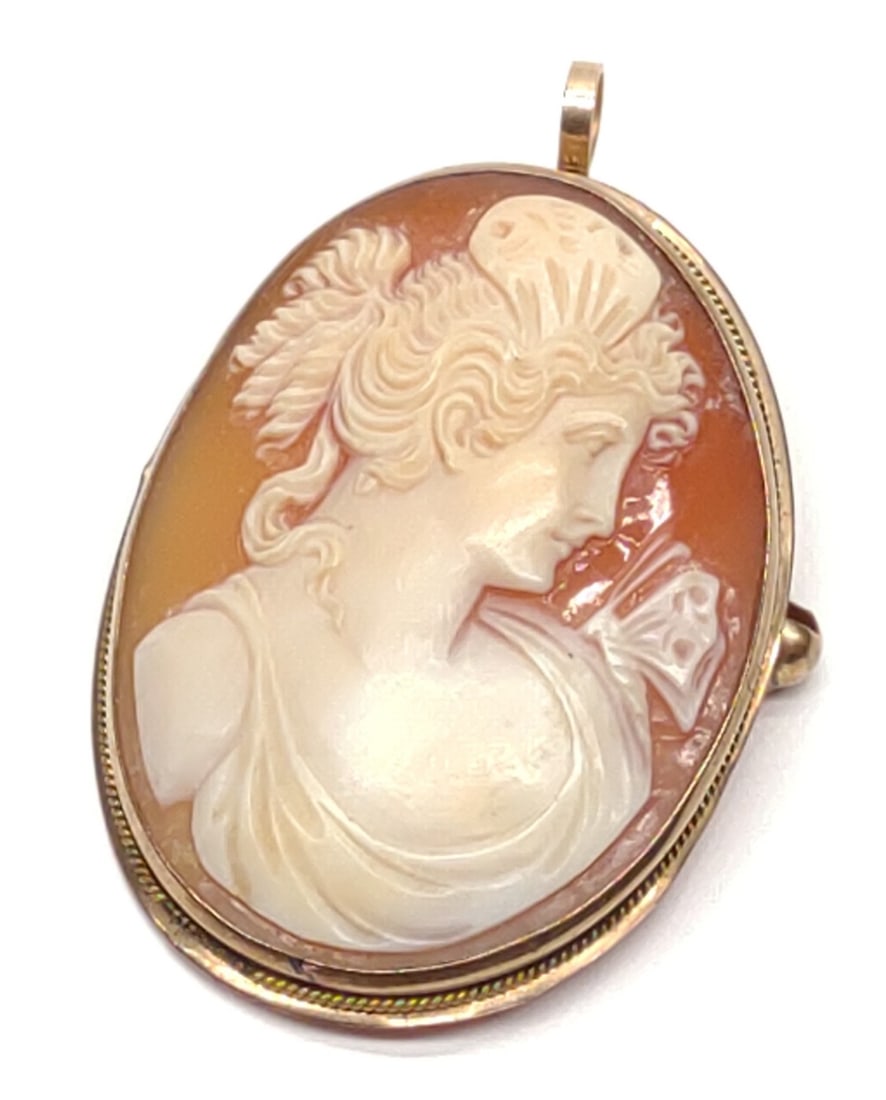 Antique 10K Gold Carved Cameo Brooch / Pendant: An antique, late 1800s, 10 karat yellow gold carved cameo brooch / necklace pendant. Pin arm is missing from C clasp. Has folding pendant loop on backside. Unmarked. Has been tested for gold purity. T