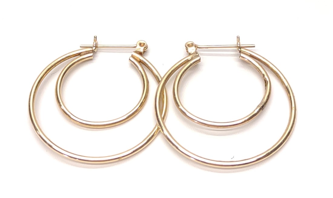 14K Yellow Gold Double Hoop Earrings (27mm): A pair of 14 karat yellow gold double hoop earrings. Each hoop is 27mm wide. Posts are marked "14K". Has been tested for gold purity. Total weight: 1.68 grams. SHIPPING OPTIONS AVAILABLE: UPS 'Pack &