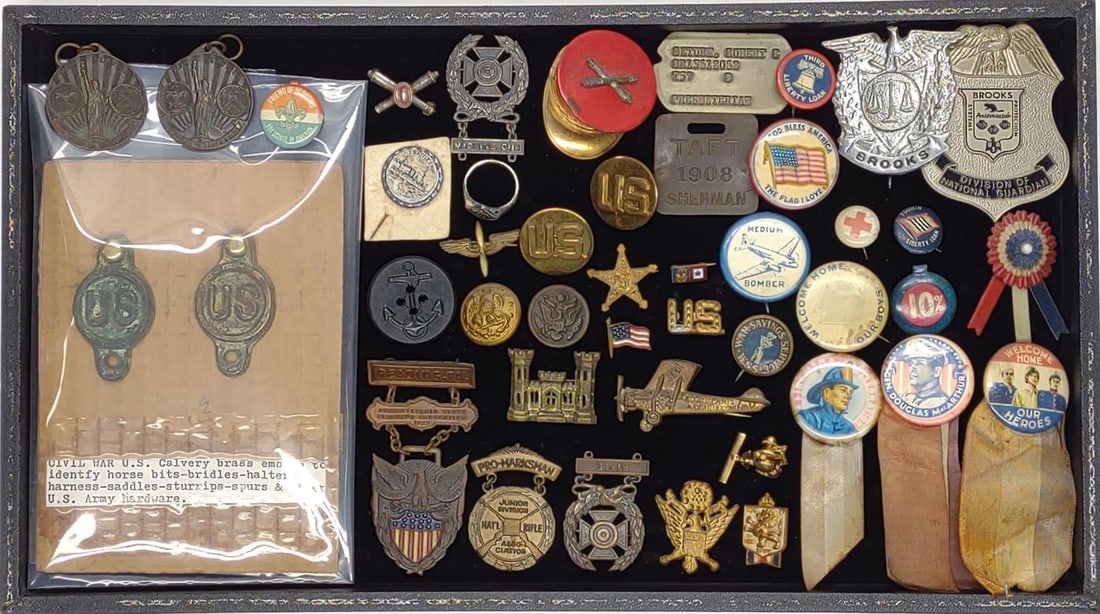 45 Early Military, BSA, Rescue Pins & Metals: 45 U.S. military Civil War & WWII, Boy Scouts of America, and fire fighting pins and medals. Includes two US Civil War cavalry brass emblems, US Battle Ship Maine pin, engineer's castle pin, Firemen's