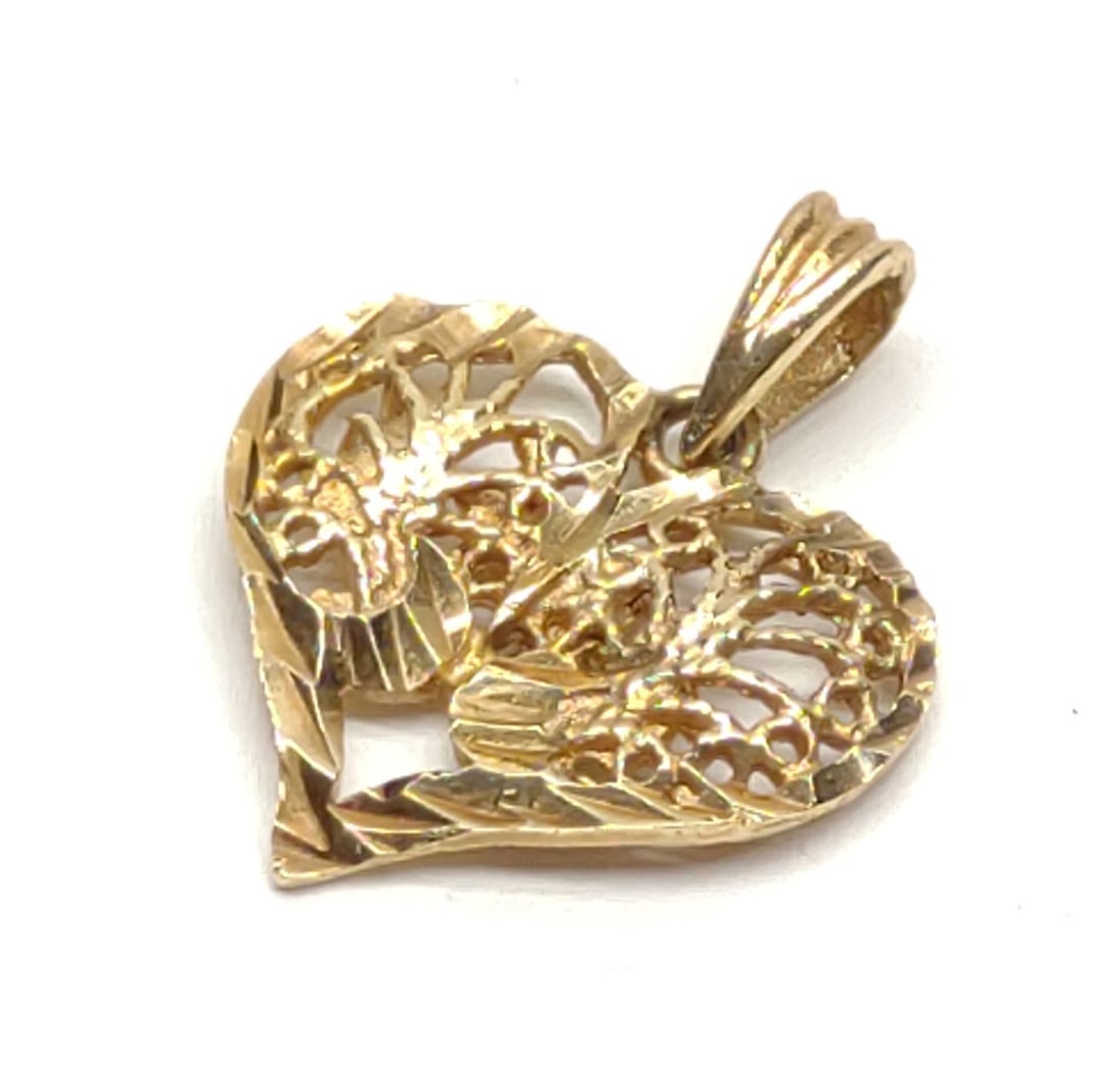 14K Yellow Gold Filigree Heart Pendant: 14 karat yellow gold filigree heart shaped necklace pendant. Marked "14K" on backside. Has been tested for gold purity. Total weight: 1.23 grams. SHIPPING OPTIONS AVAILABLE: UPS 'Pack & Ship' or LiveS