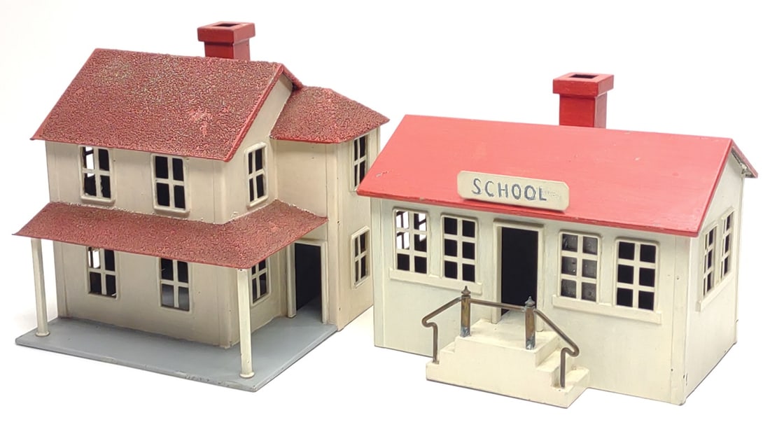 2 Steel G Scale Train Garden House & School: 2 Vintage metal steel constructed G scale train garden buildings. Includes two story house with front porch and chimney, and single story school house with chimney. 2 story house measures approx. 8 1/