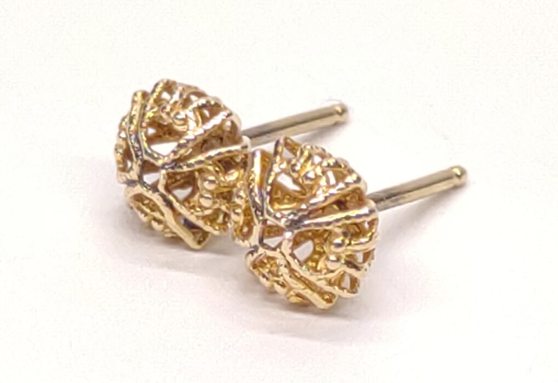 Antique 14K Yellow Gold Crown Stud Earrings: Pair of antique 14 karat yellow gold crown shaped stud earrings with 14k post backings. Earrings are unmarked, backings are marked "14K". Both have been tested for gold purity. Total weight: 0.69 gram
