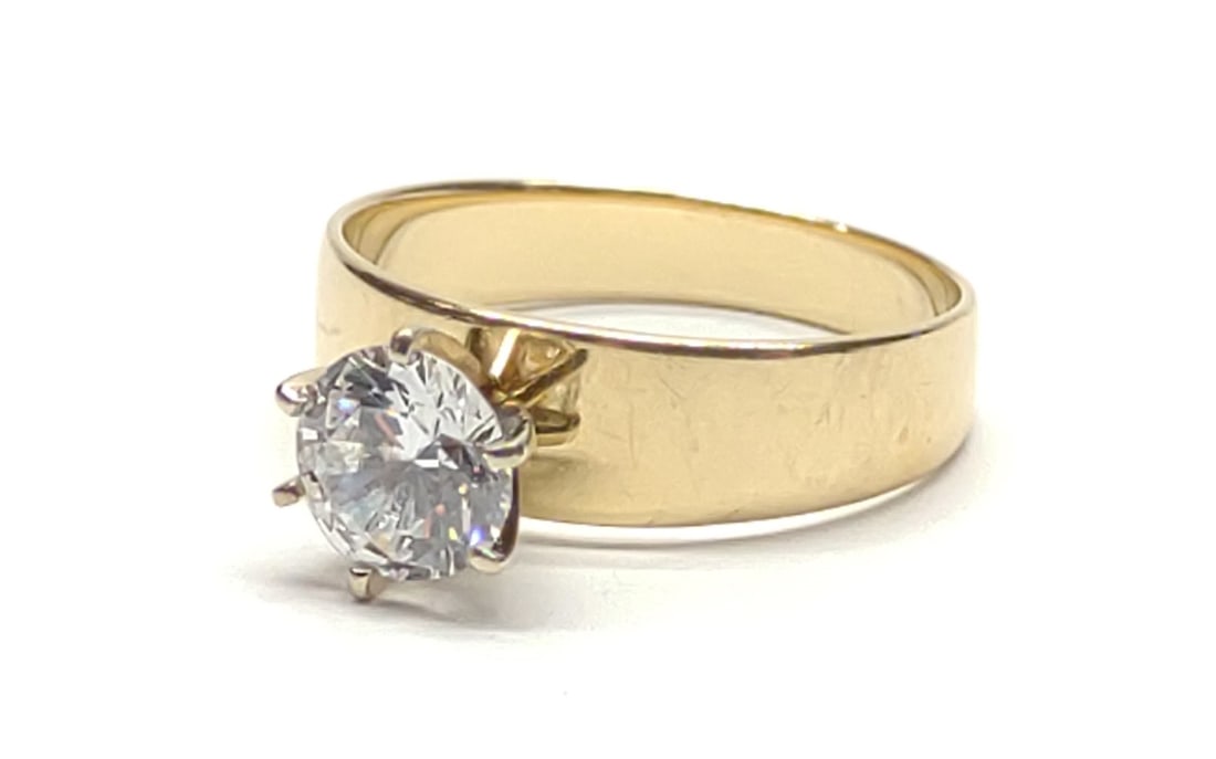 10K Yellow Gold Cubic Zirconia Solitaire Ring sz 7: 10 karat yellow gold cubic zirconia solitaire high setting ring. Inner band is marked "RL 10K". Has been tested for gold purity and stone type. Ring size 7. Total weight: 3.0 grams SHIPPING OPTIONS AV