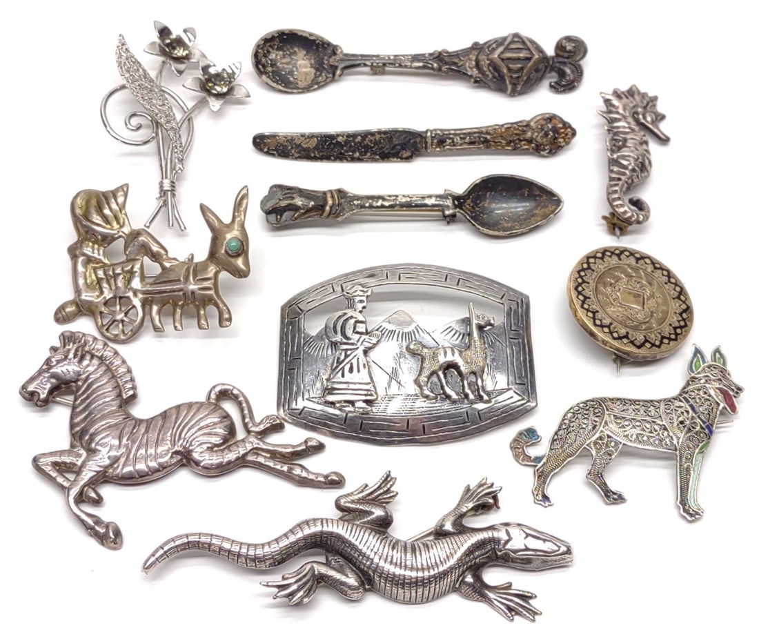 11 Vintage Sterling Silver Figural Brooches / Pins: A group of vintage sterling silver figurally shaped brooches. Includes Silverman Brothers zebra brooch (Marked "925 SB"), Van Dell flower brooch (marked "Van Dell Sterling"), jose rosas sterling filig