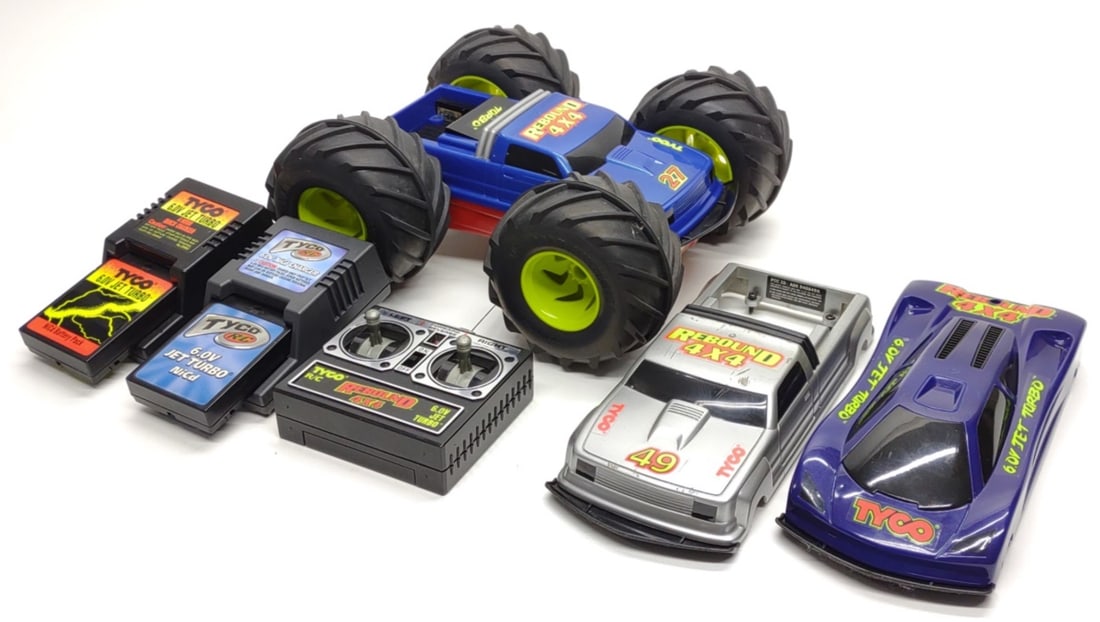1996 Tyco R/C Rebound 6V Turbo Jet Toy Truck Works: Vintage 1996 Tyco RC Rebound 4x4 6.0 Volt Turbo Jet r/c car / truck toy with 1994 Japan Shells. Includes Rebound r/c car, 1 extra silver truck shell, 1 extra purple car shell, controller, (2) 6V turbo