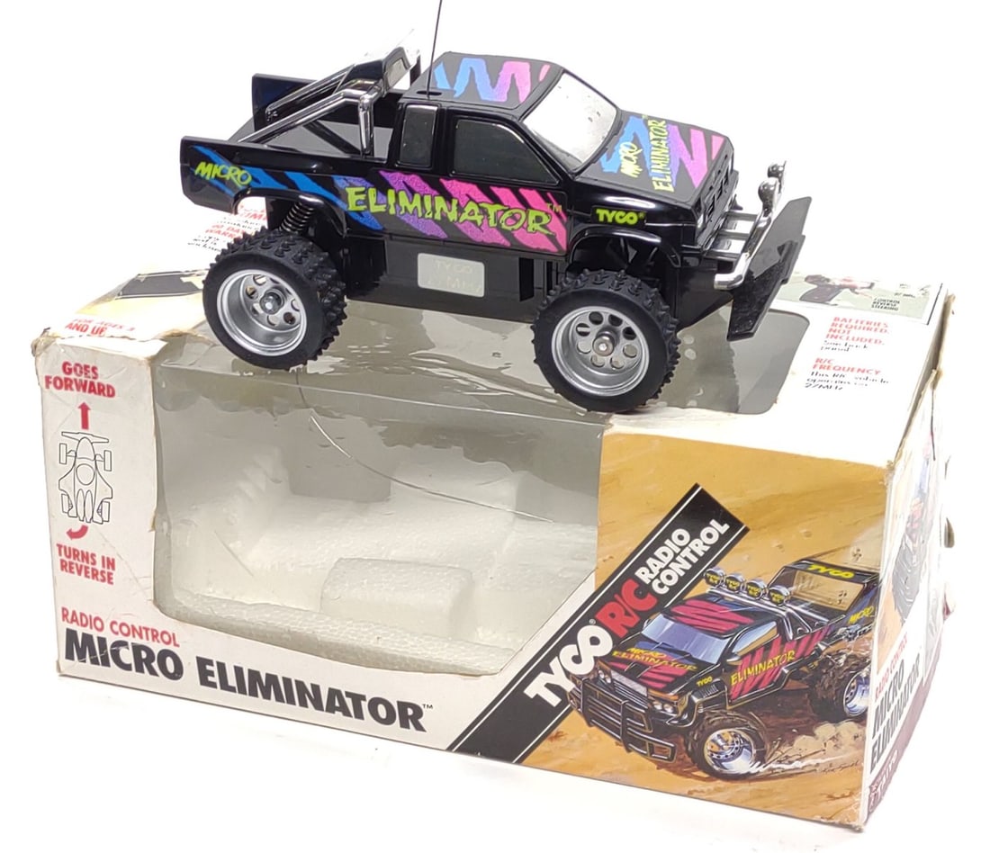 1991 Tyco R/C Micro Eliminator Truck & Box (Works): Vintage 1991 Tyco R/C Micro Eliminator toy truck, complete in original box. Includes Micro Eliminator truck, controller, and box. Truck and controller are tested and working. Box measures approx. 10 x