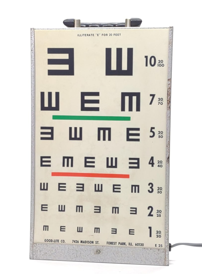 Vintage Good-Lite Lighted Eye Exam Chart (Works): Vintage metal Good-lite fluorescent bulb lighted eye exam chart. Tested and working. Sign is marked "Good-Lite Visual Acuity Chart" on top. Includes two removable chart sheets. Measures approx. 15 1/2