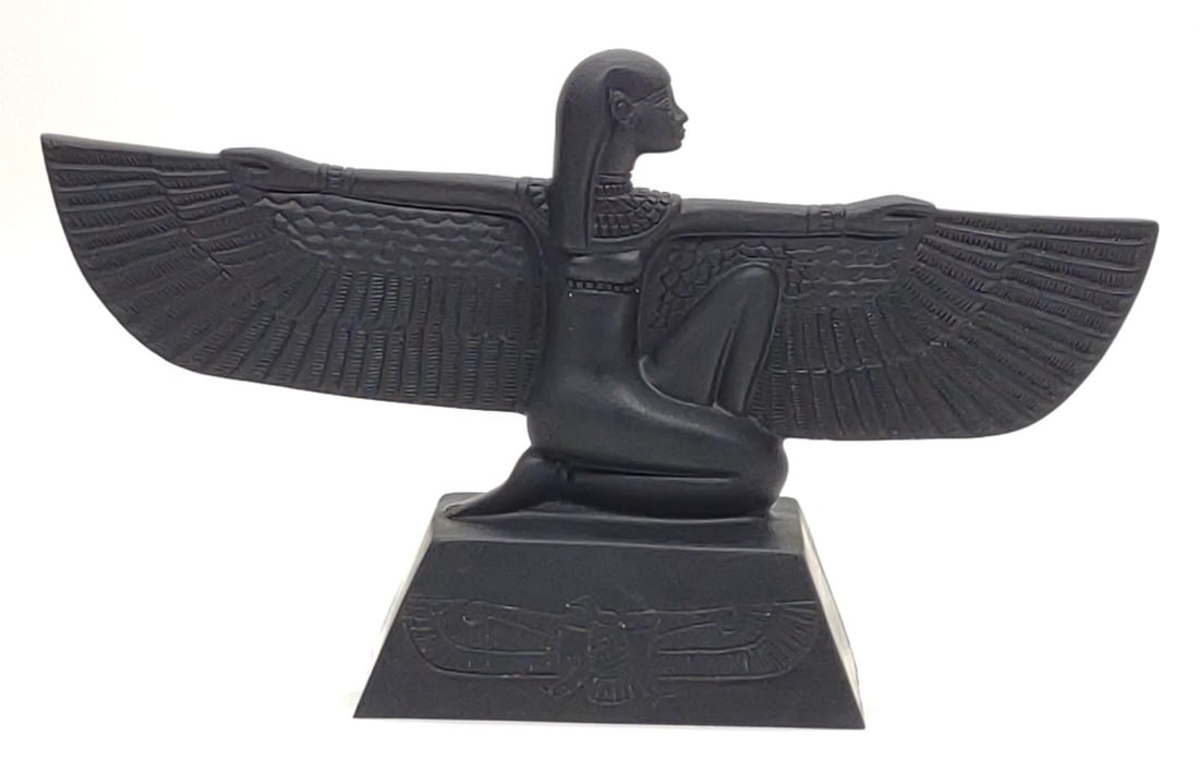9" Egyptian Winged Goddess Isis Statue: Vintage Egyptian goddess of fertility and motherhood Isis statue. Depicts Egyptian goddess Isis crouched on a pedestal with open wings, depicting goddess Nekhbet. Sculpture is marked "Made In Egypt".