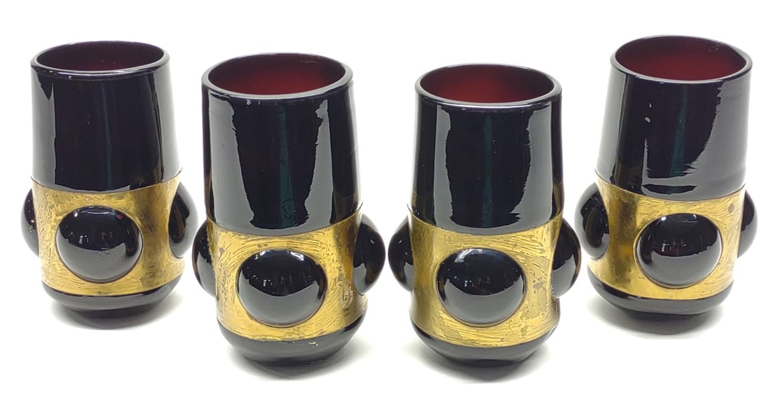 4 Amethyst & Brass Blown Drinking Glasses: 4 Vintage, Art Deco style, hand blown amethyst glass and brass banded drinking glasses. Pontil mark in underside. Each glass measures approx. 5 1/4 in. tall and 4 1/3 in. diameter. SHIPPING OPTIONS AV