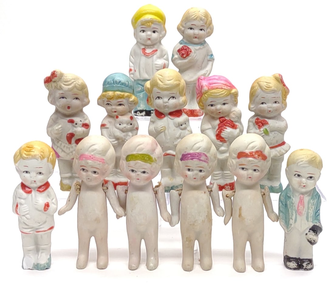 13 Vintage Japan Frozen Charlotte Bisque Dolls: Group of 13 vintage Japan Frozen Charlotte and penny Dolls / figurines. All are marked "Made In Japan". Includes 4 flapper girls with posable jointed arms. Tallest measures approx. 3 1/2" tall. SHIPPI