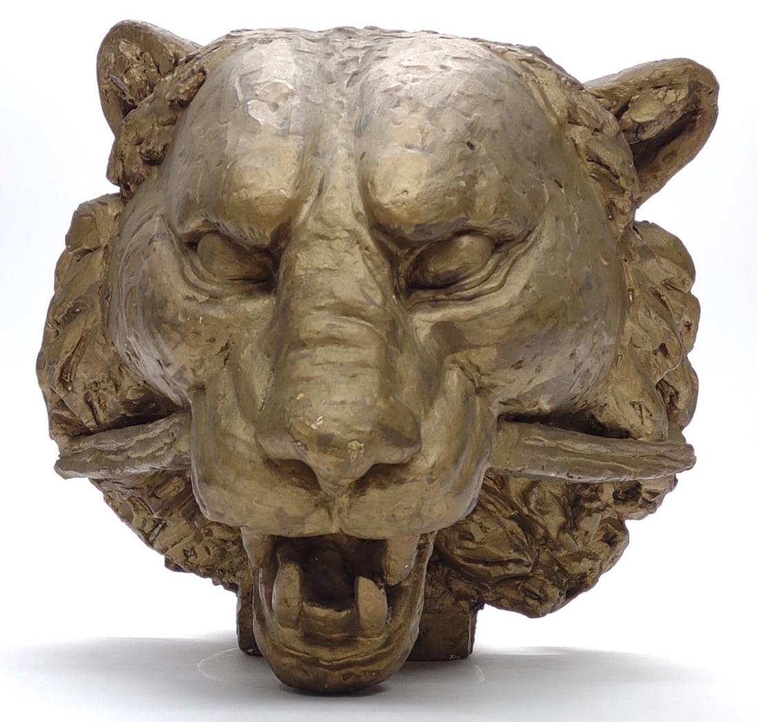 1938 Hallie Davis Signed Lion Head Sculpture: Dated 1938, Hallie Helena Davis (1896 - 1972) lion head bust sculpture. Sculpted with plaster, and painted gold. Artist signature on backside of ear. Repair to right K9 tooth. This art piece measures
