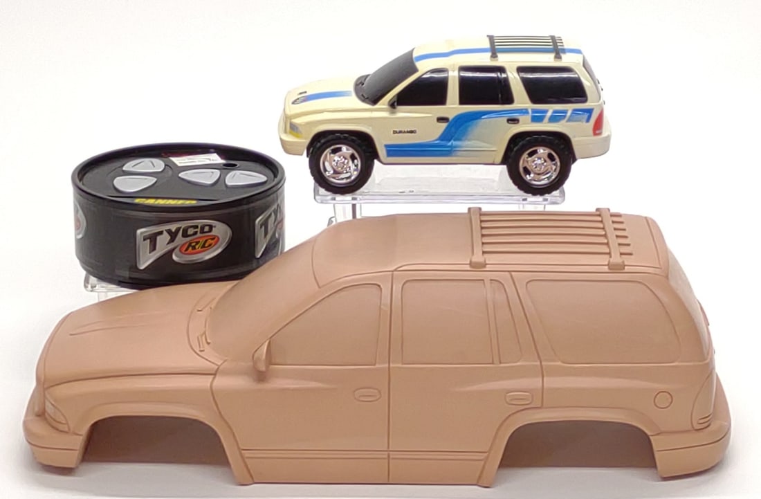 Pre-Production Tyco RC Canned Heat Durango Toy Car: Vintage Tyco Toys R/C preproduction Dodge Durango Canned Heat toy car. Includes test shot car, sample controller, and larger solid pattern casting of body. Car and controller are tested and working, m