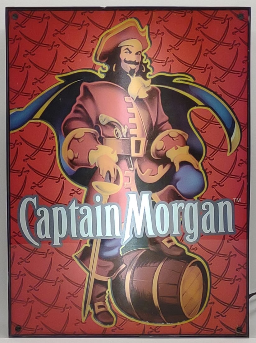 Captain Morgan Lighted Advertising Sign (works): 2007 Captain Morgan box light illuminated bar advertising sign. Sign is marked "Captain Morgan Rum Co. 3E Trading, LLC" on underside. Small chip on top edge. Testing and working. Measures approx. 18 1