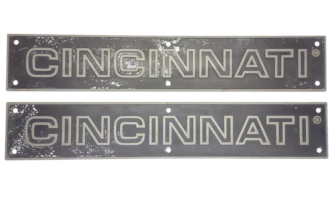 2 Metal Cincinnati Milling Machine Co. Name Plates: 2 Vintage mid century Cincinnati Milling Machine Company milling machine metal embossed name plates. Each sign displays Cincinnati Milling Machine Company logo with copyright symbol. Each sign measure