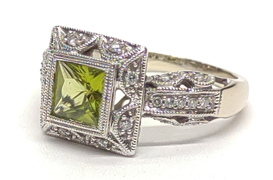 Art Deco 14K W Gold Peridot & Diamond Ring sz 7.75: Vintage, art deco, 14 karat white gold filigree ring with princess cut peridot (approx 1.4ct, RI 1.67) and 26 round cut diamonds (0.39 ctw). Ring size 7.75. Inner band is marked "14K" with makers hall
