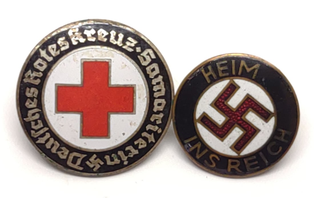 (2) WWII German Badges Heim Ins Reich & Red Cross: Includes world war two (WW2) German red cross badge (marked Ges Gesch), and WWII German Heim Ins Reich badge (maker C.W.). Largest measures approx.: 1" diameter. SHIPPING OPTIONS AVAILABLE: UPS 'Pack 