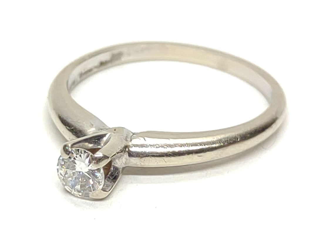 14K White Gold 0.25ct Diamond Solitaire Ring sz 6: Fiancee 14 karat white gold solitaire round cut diamond wedding ring. Ring size 6. Features round cut 0.25 carat diamond. Inner band is marked "Fiancee 14K". Has been tested for gold purity and diamon