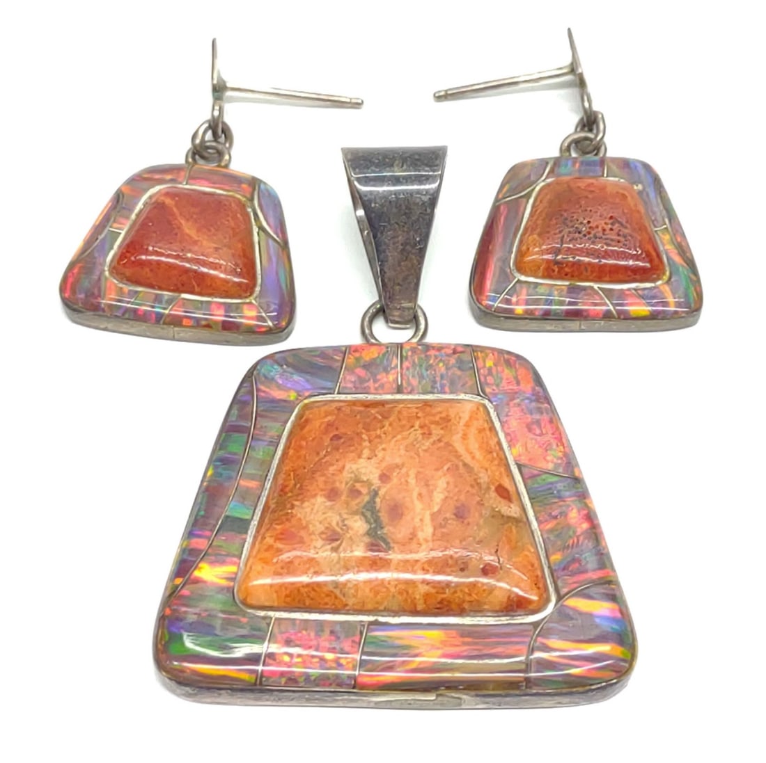 Zuni Reynetsa Leland Spiny Oyster Opal Jewelry Set: Vintage native american signed, Reynetsa Leland (Zuni) sterling silver, spiny oyster and fire opal inlaid necklace pendant and post drop earrings set / suite. Backside is stamped "Sterling" with "RL" 