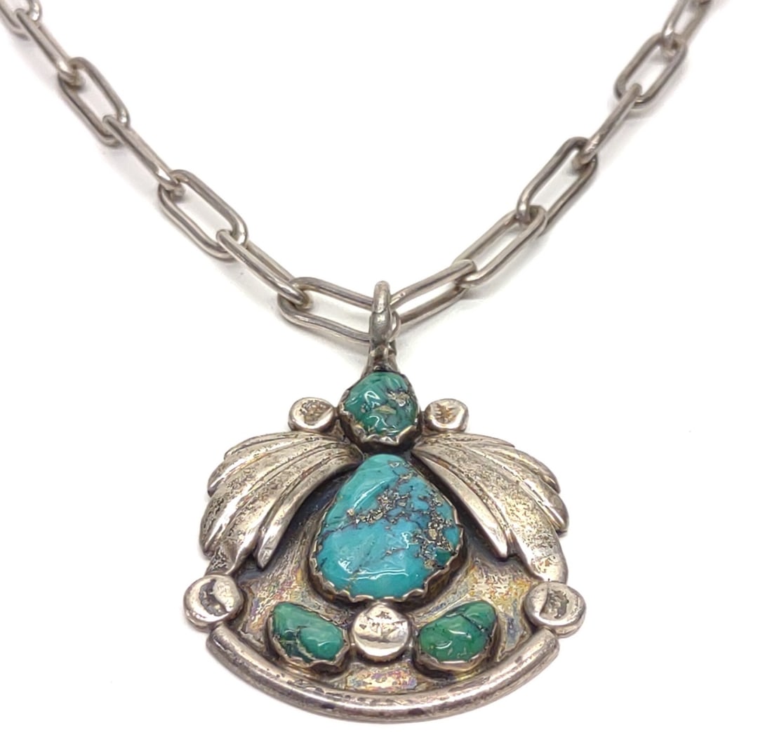 Native American Sterling & Turquoise Necklace 28"L: Vintage native american sterling silver and turquoise chain link pendant necklace. Chain measures 18" long, 5mm wide. Pendant and chain are unmarked. Both have been tested for silver purity. Total wei