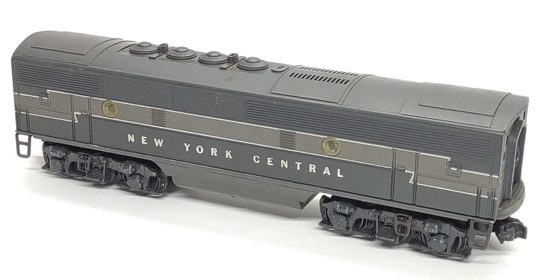 1953 Lionel 2344C New York Central F3 B Train: Post-war, 1953-1955, Lionel 2344C F-3 B New York Central diesel train unit. Variation C with moulded in louver vents on top. Non-powered unit. O-Gauge. Measures approx.: 13 x 3 1/2 x 2 1/2 in. SHIPPIN