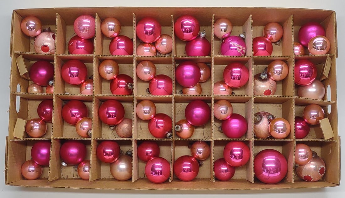 67 Vintage Pink Glass Christmas Ornaments: A group of 67 vintage round pink glass christmas tree ornaments. Includes shiny brite "Made in USA" marked ornaments. Largest ornament measures approx.: 3 x 2 1/2 x 2 1/2 in. In-house international sh