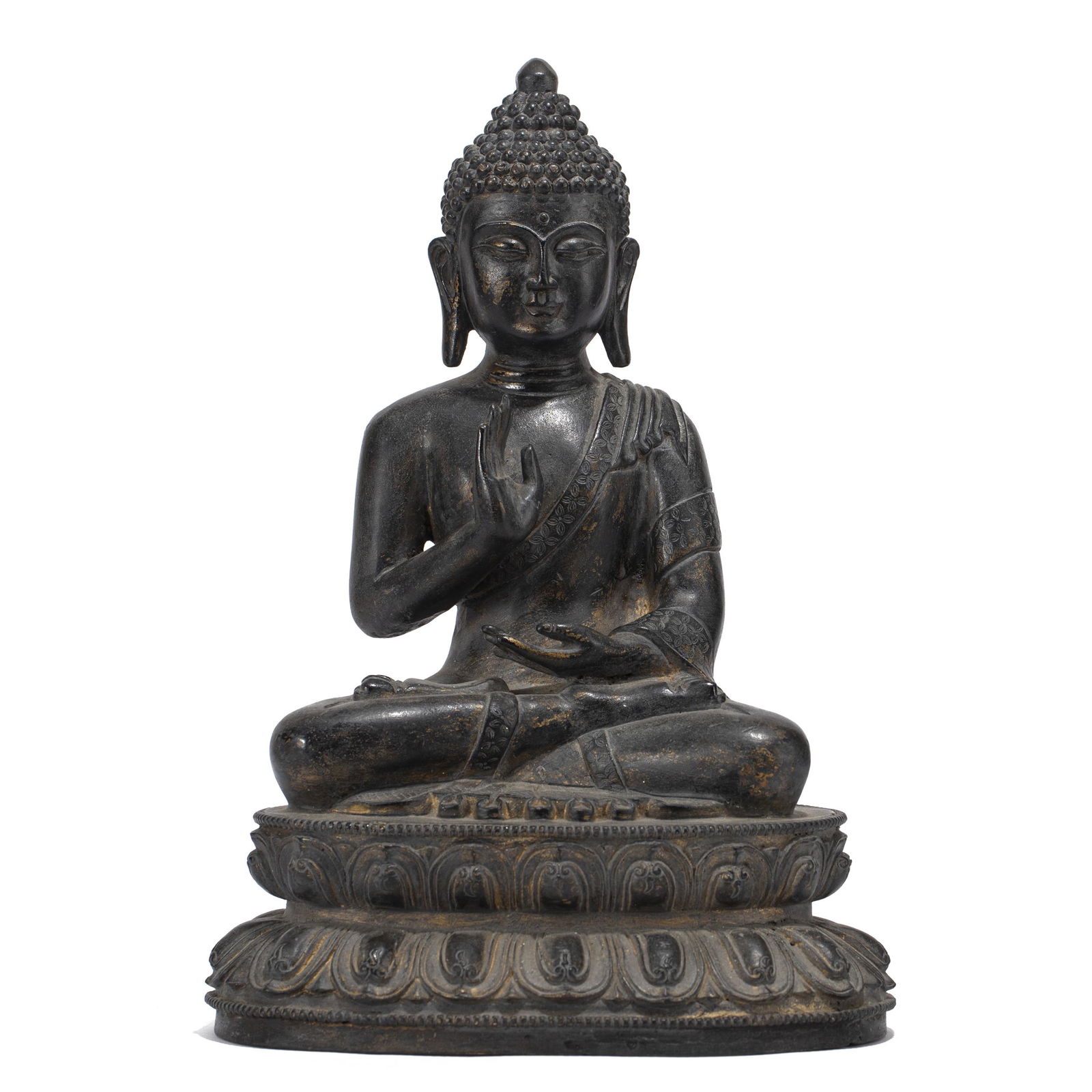 A CHINESE BRONZE FIGURE OF SHAKYAMUNI: A CHINESE BRONZE FIGURE OF SHAKYAMUNI shakyamuni is depicted seated in dhyanasana on a double lotus base, the left hand in dhyanamudra. The figure is dressed in long flowing robes, with a serene expre