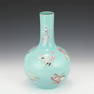 A CHINESE CELADON GLAZE FAMILLE ROSE PORCELAIN VASE