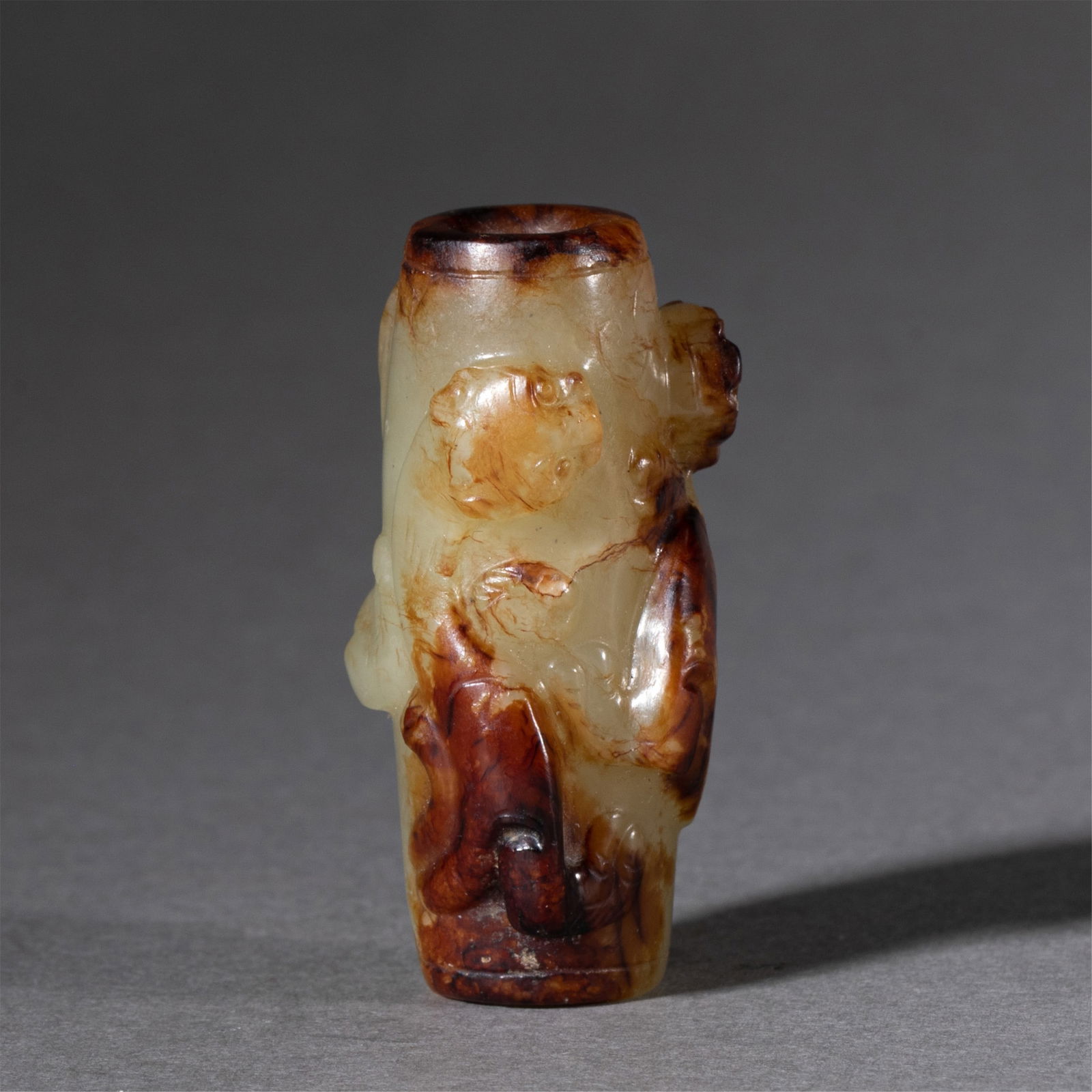 A CHINESE CARVED JADE TIGER BEAD (1 of 9)