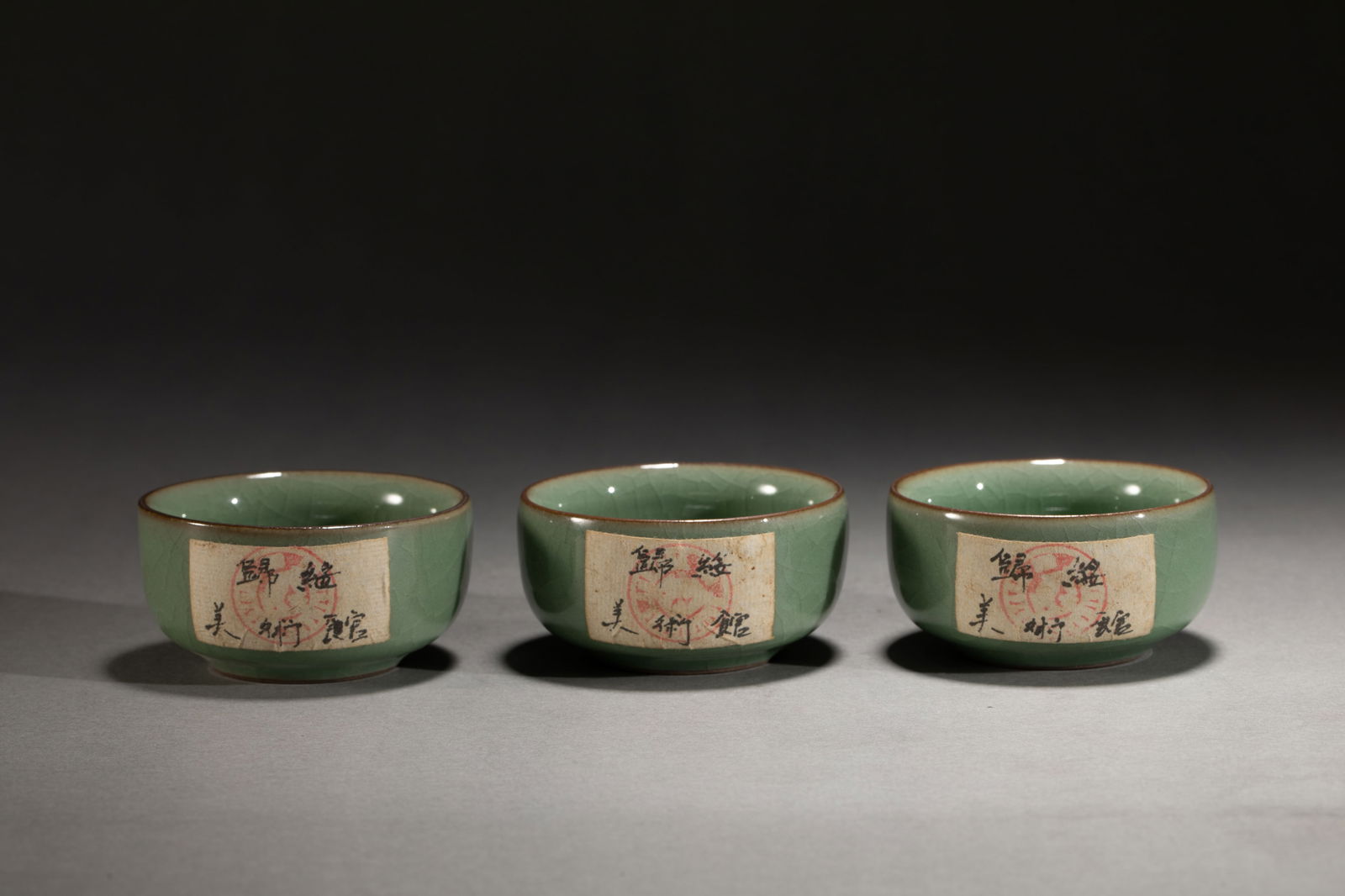 A SET OF THREE CELADON GLAZE CUPS: A SET OF THREE CELADON GLAZE CUPS Each deep rounded sides rising from a circular foot to the circular rim, applied overall with celadon glaze. DIMENSIONS: L. 6.5 cm. W. 6.5 cm. H. 3.5 cm. Weight 200 g