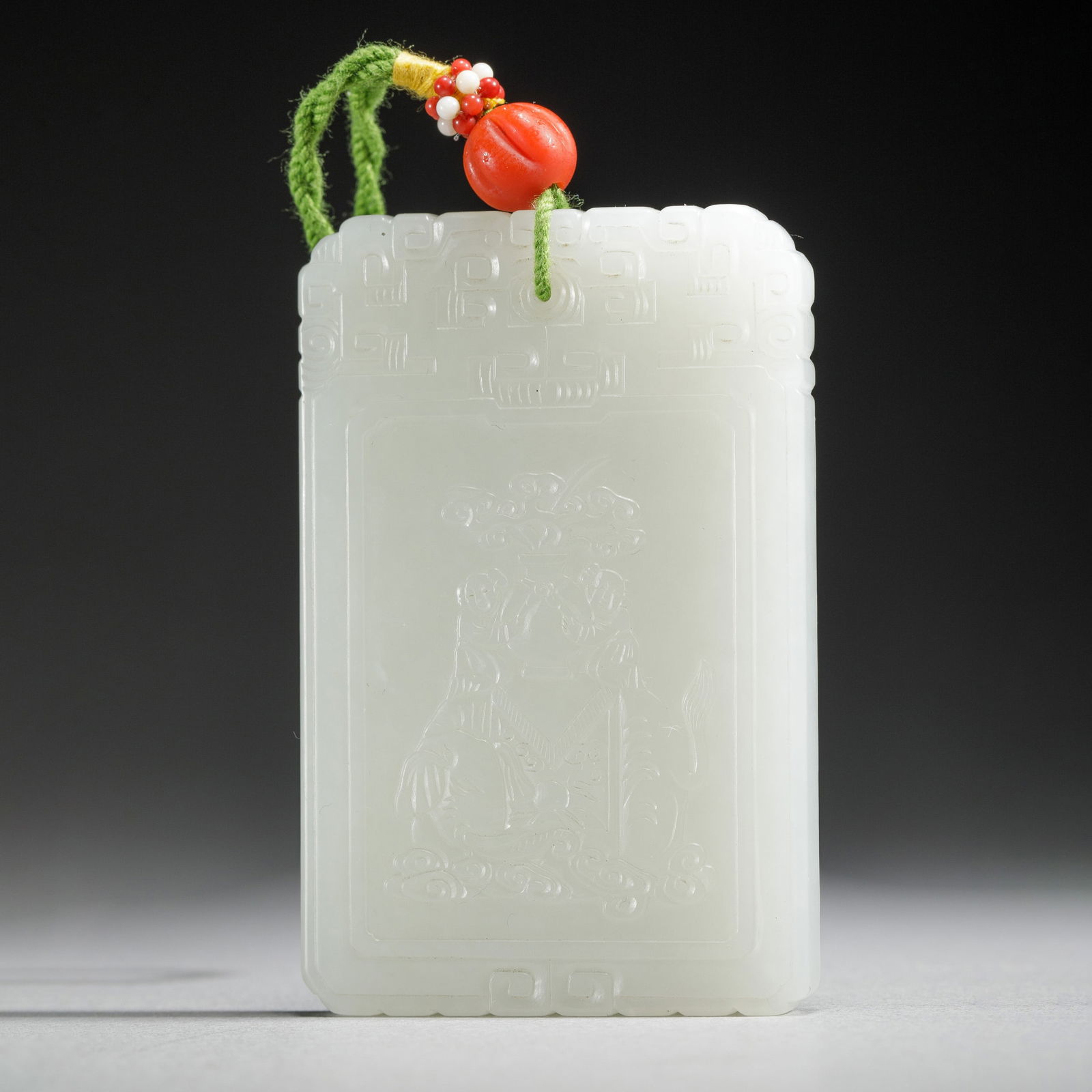 A CARVED WHITE JADE ELEPHANT PLAQUE (1 of 14)