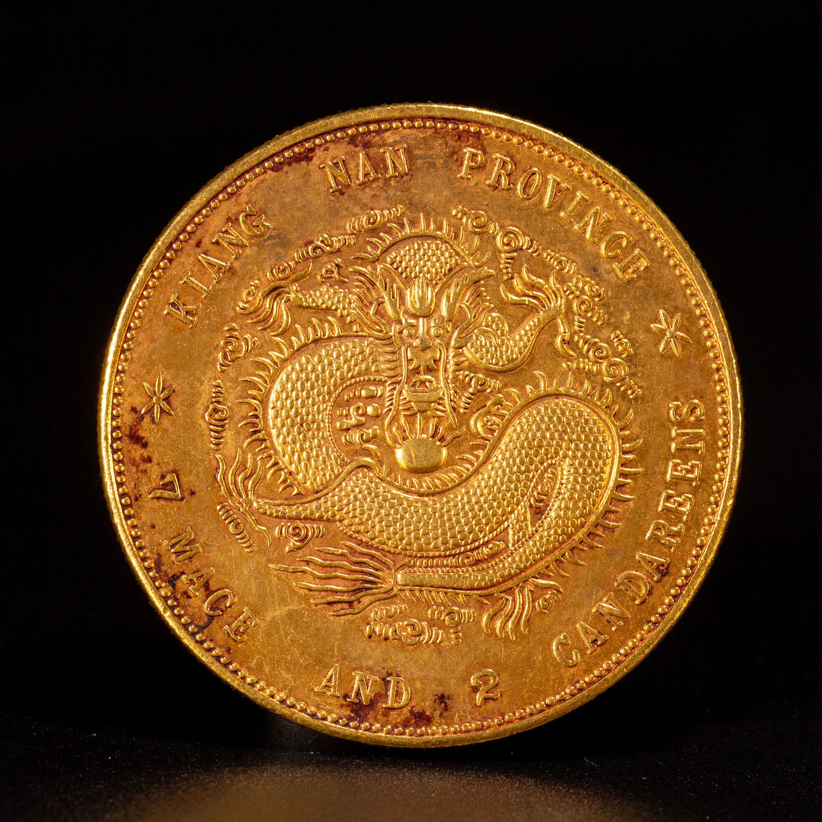 A CHINESE SILVER-GILT COIN (1 of 6)