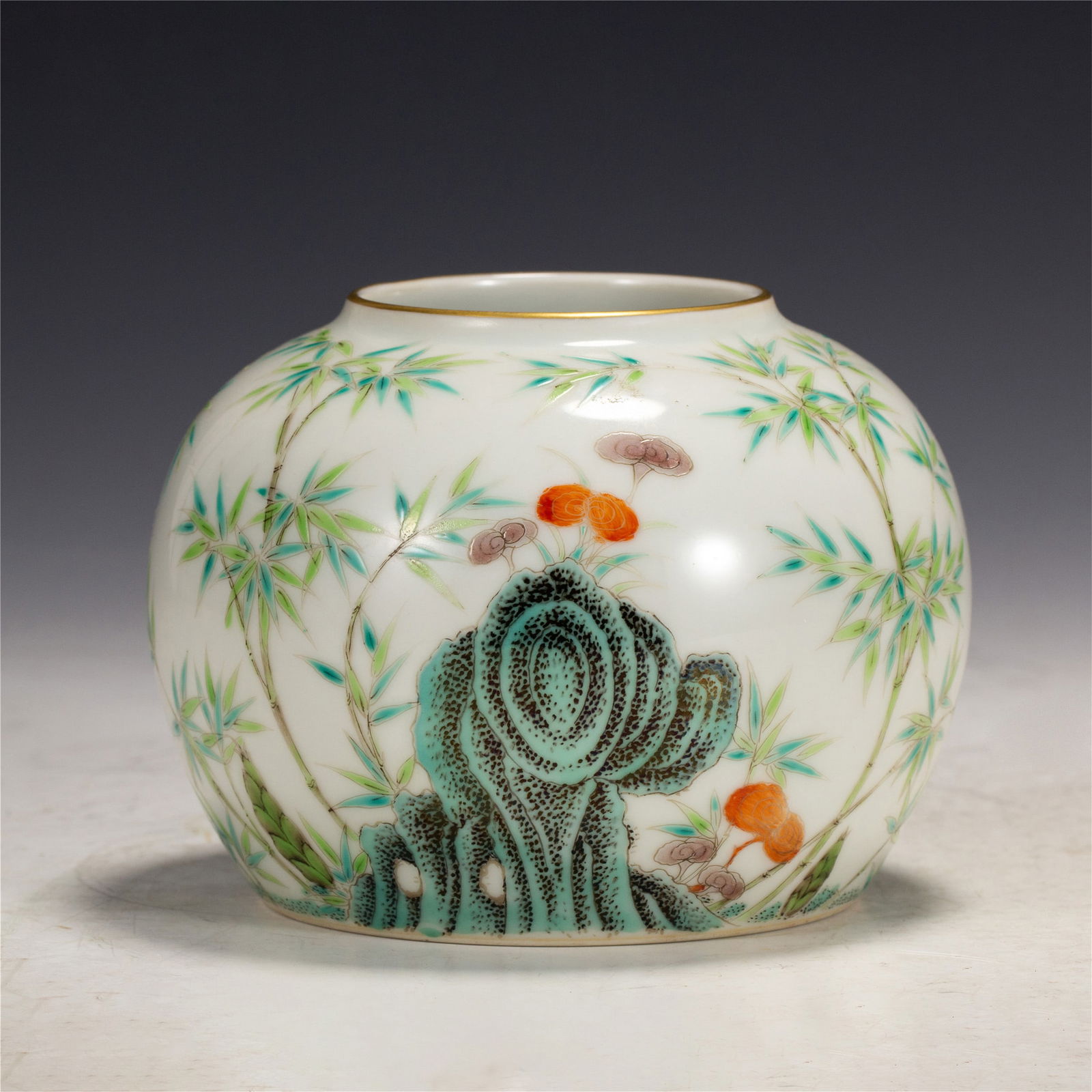 A FAMILLE ROSE BAMBOO WATERPOT: A FAMILLE ROSE BAMBOO WATERPOT Finely painted with bamboo, lingzhi and rock at the exterior. DIMENSIONS: L. 11 cm. W. 11 cm. H. 8 cm. Weight 290 grams. HAVE A SIMILAR ITEM TO SELL? CONTACT: INFO@GORDO